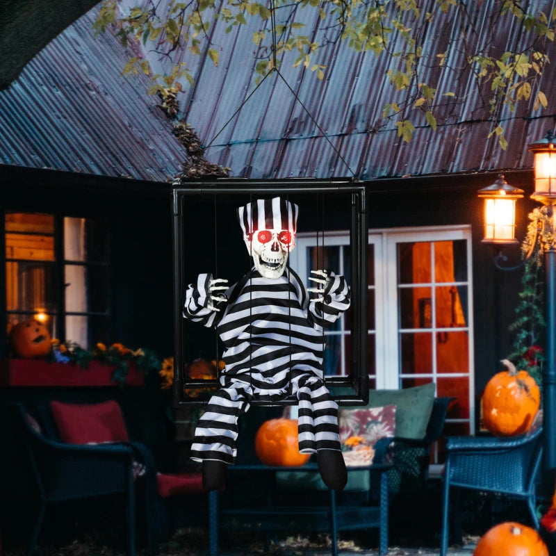 Halloween Animated Hinging Skeleton Prisoner in Cage with Glowing LED Eyes, Spooky Skeleton Scary Halloween Decorations, Battery Operated, Indoor Party Props